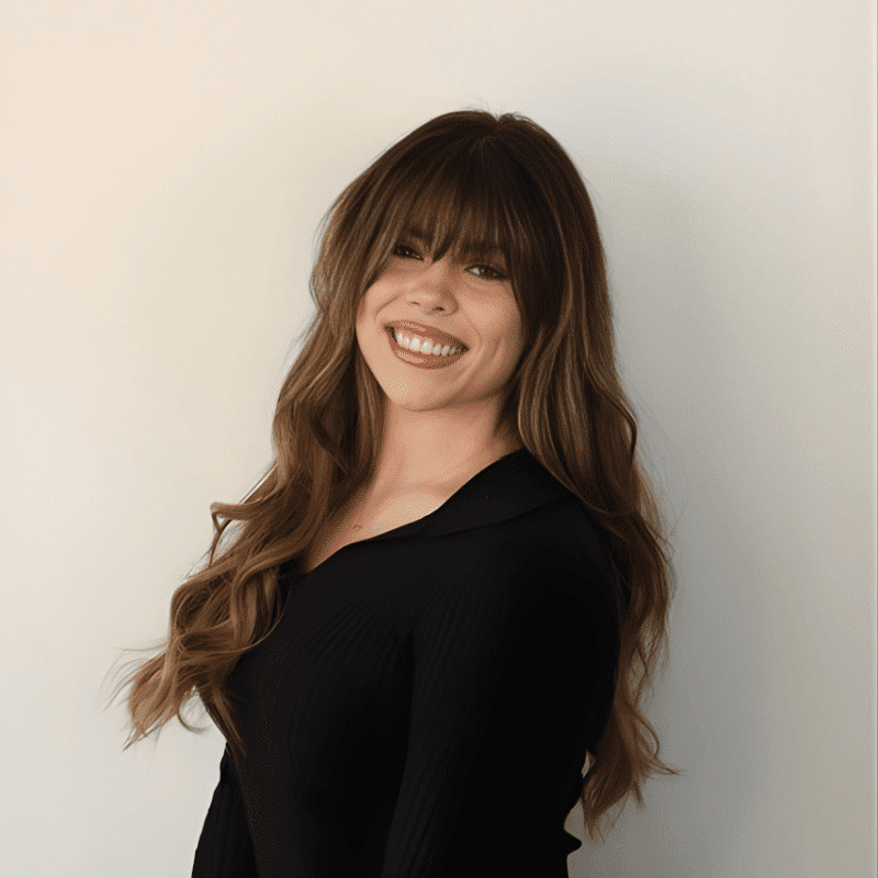 Portrait of Ireland, a professional stylist at DBK Hair Studio, showcasing their expertise and style.