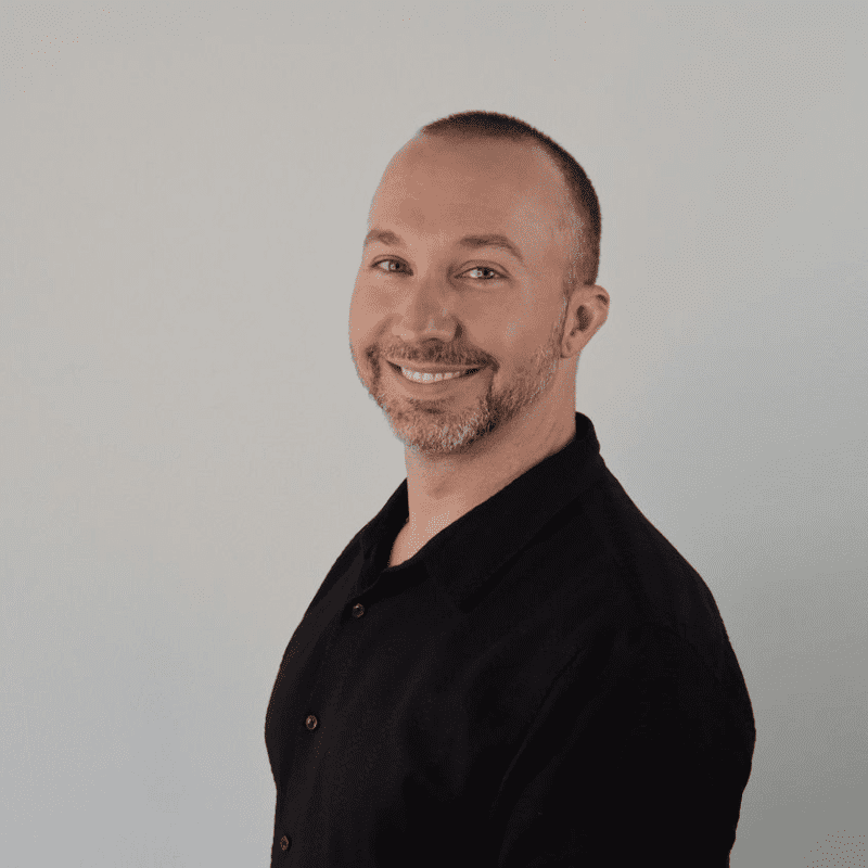 Portrait of Doug, a professional stylist at DBK Hair Studio, showcasing their expertise and style.