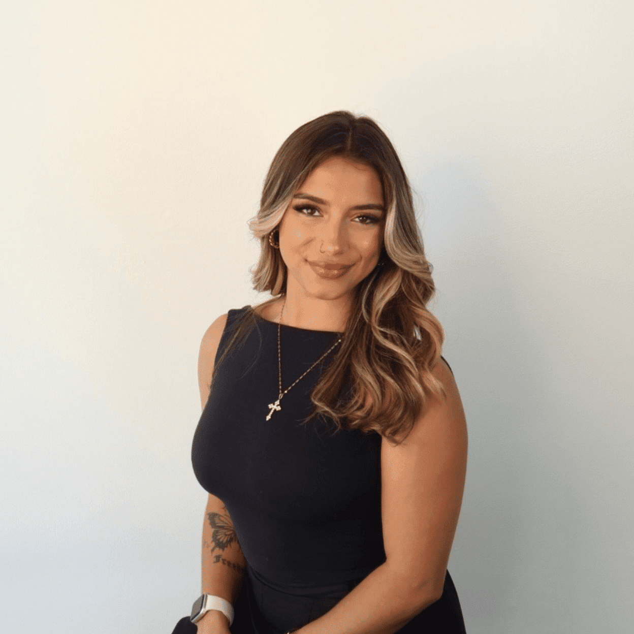 Portrait of Hailie, a professional stylist at DBK Hair Studio, showcasing their expertise and style.